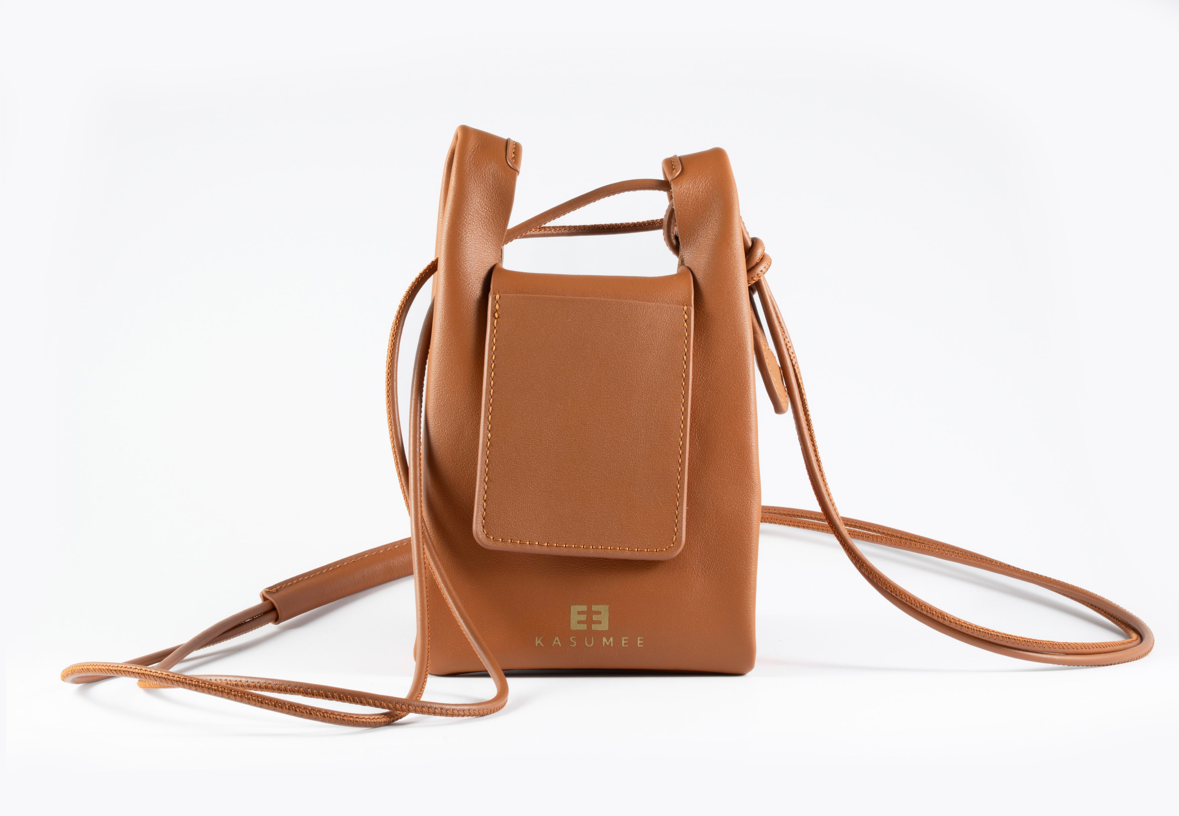 Brown leather crossbody bag with a visible brand logo on a white background
